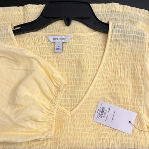 Elbow puff sleeve smocked blouse